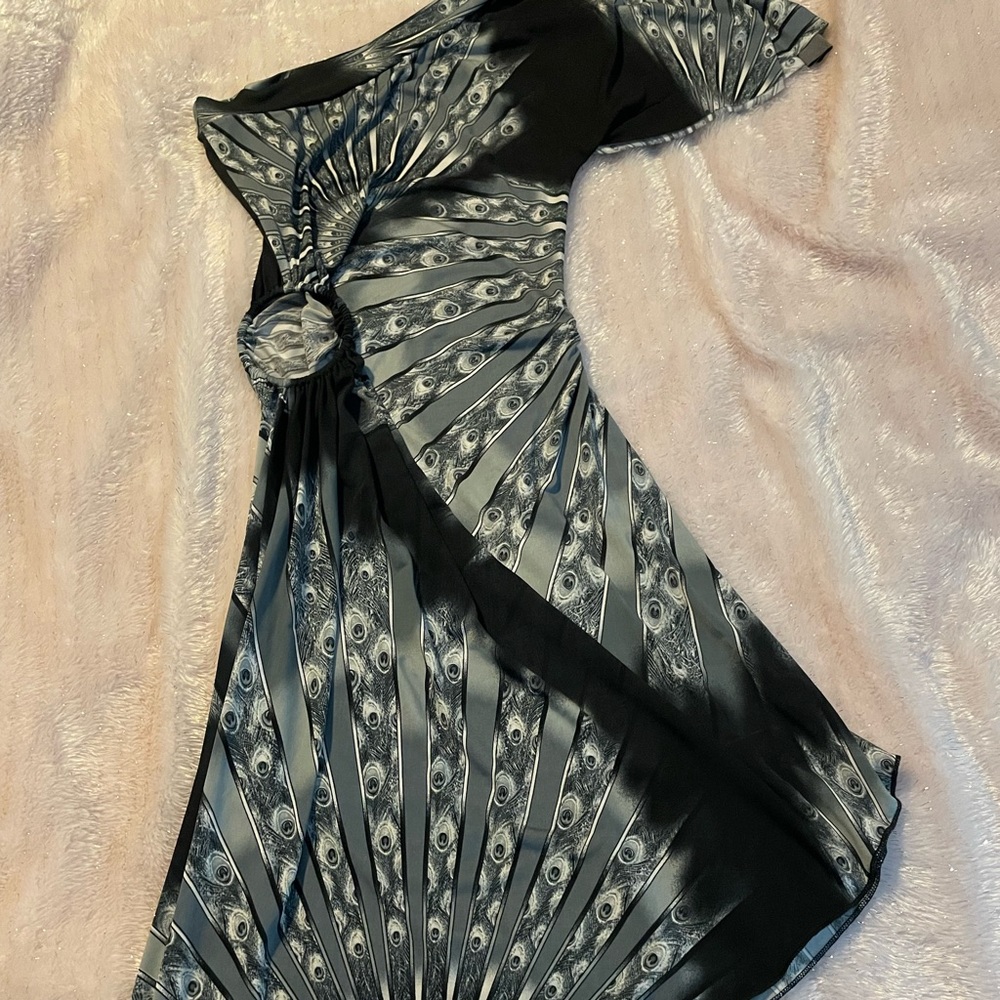Peacock design off the shoulder asymmetrical dress with keyhole on the side!